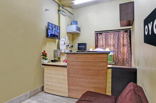 TV a/nebo společenská místnost v ubytování Super OYO 16535 Chilika Residency