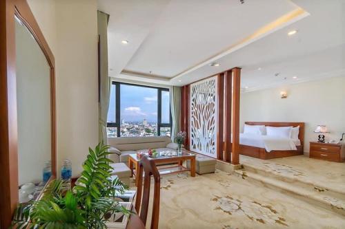 Кровать или кровати в номере Phuoc My An Beach