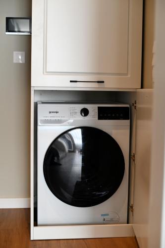 a microwave oven sitting on top of a dishwasher at The Swing in Burgas City