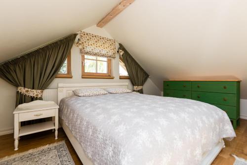 Postel nebo postele na pokoji v ubytování Family apartament