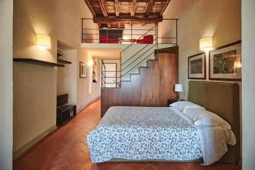 Ένα ή περισσότερα κρεβάτια σε δωμάτιο στο My Boutique Home in Florence