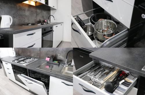 Kuchyň nebo kuchyňský kout v ubytování Apartmani i sobe Laganini