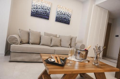 a living room with a couch and a coffee table at Rammos Managed By Dedeman in Bodrum City
