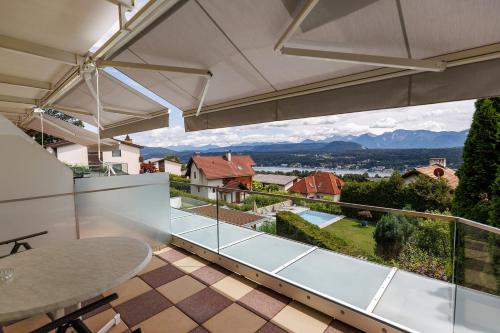 a view from the balcony of a house at Sun & See in Velden am Wörthersee