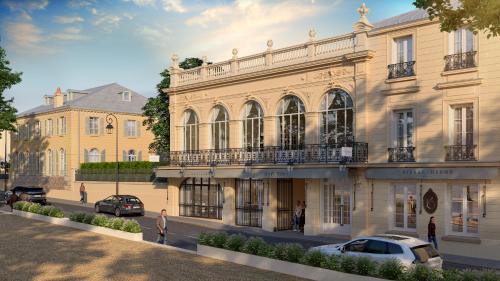 a large building with cars parked in front of it at Hôtel Les Lumières in Versailles