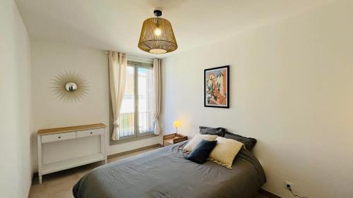 Ένα ή περισσότερα κρεβάτια σε δωμάτιο στο Appartement Citadella 1 Calvi