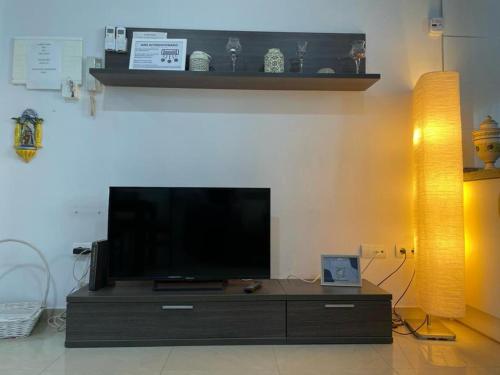 TV at/o entertainment center sa KAIROS HOME y garaje, Algemesi Home