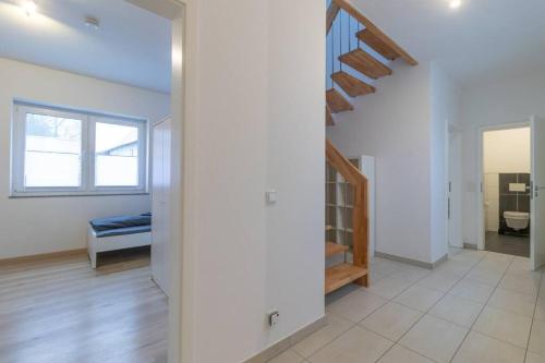Ένα ή περισσότερα κρεβάτια σε δωμάτιο στο 200m² Wohnung mit 6 Schlafzimmer