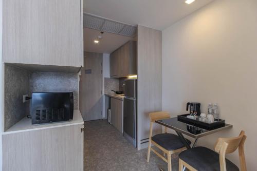Kuchyň nebo kuchyňský kout v ubytování Jasmine Grande Residence