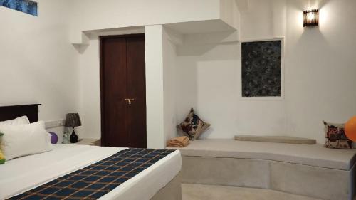 Ένα ή περισσότερα κρεβάτια σε δωμάτιο στο Sinali Villa
