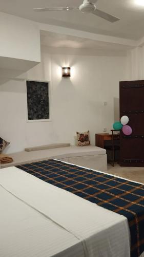 Ένα ή περισσότερα κρεβάτια σε δωμάτιο στο Sinali Villa