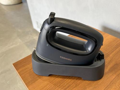 a toaster sitting on top of a wooden table at ホテルプラタナス新横浜 in Yokohama
