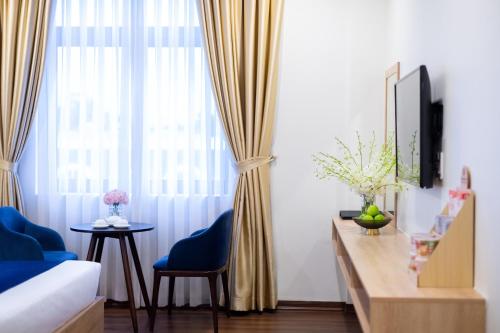 TV a/nebo společenská místnost v ubytování Sandals Star Hotel