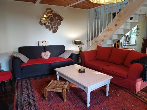 Χώρος καθιστικού στο La maison au cœur de la forêt