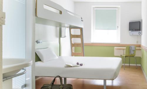Cama o camas de una habitación en ibis budget Genève Petit-Lancy