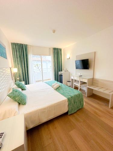 Diamant Hotel & Aparthotelにあるベッド
