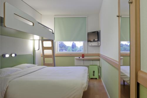 Postelja oz. postelje v sobi nastanitve ibis budget Basel Pratteln