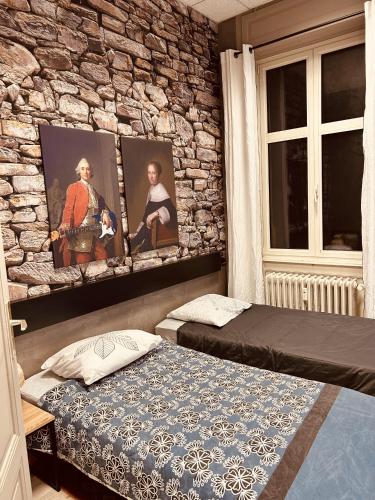 เตียงในห้องที่ LA MARIEFACTURE - Comme une Forteresse