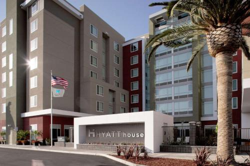 a palm tree in front of a hotel at Hyatt House San Jose-Silicon Valley in San Jose