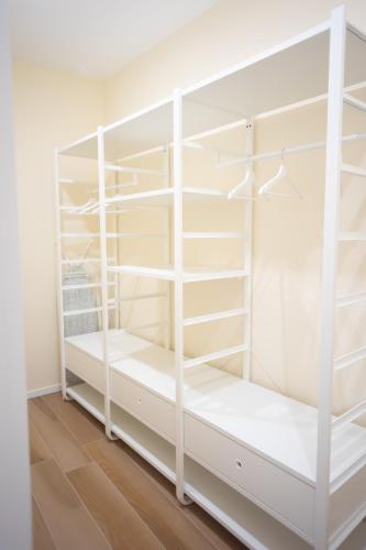 Postel nebo postele na pokoji v ubytování Dimora Amelia Luxury Apartments
