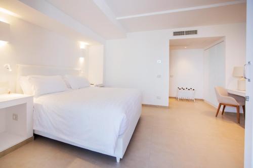 Postel nebo postele na pokoji v ubytování Pagoda Lifestyle Hotel