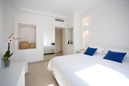 Postel nebo postele na pokoji v ubytování Pagoda Lifestyle Hotel