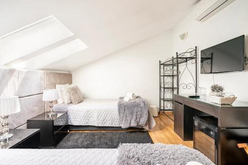 Кровать или кровати в номере Jose & Ester House