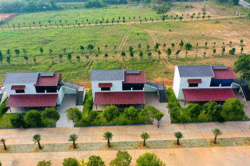 an aerial view of a house with red roofs at Lake Valley Resort and Spa Tirupati, 27 kms from Talakona Waterfall in Tirupati