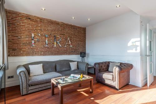Posezení v ubytování Enjoybcn Fira Apartment