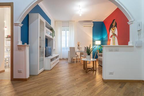 a living room with an archway and a living room at Casa Abeba a Torre Maura in Rome