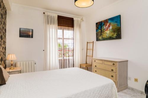 Säng eller sängar i ett rum på NEW!! 1 Bedroom apartment Tavira - Santa Luzia