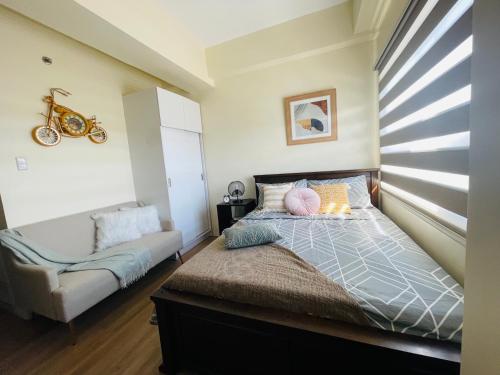 Postel nebo postele na pokoji v ubytování Northwoods Place Condominium
