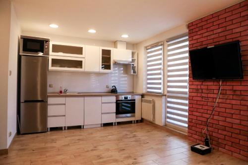 Η κουζίνα ή μικρή κουζίνα στο Apartament dla pracowników Katowice