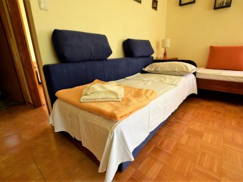 Katil atau katil-katil dalam bilik di Apartmani Pinka