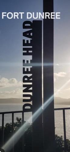 a book cover for the fort dunierce lighthouse at Old Post Office in Linsfort