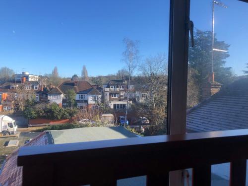 a view of a city from a window at Hazelcroft Guest House in London