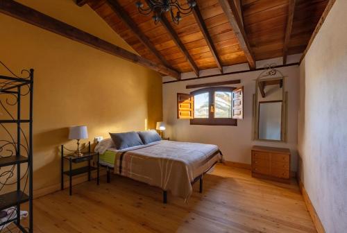 Ένα ή περισσότερα κρεβάτια σε δωμάτιο στο Apartamento Almazara de Paulenca
