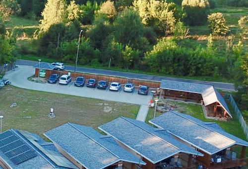 an aerial view of a house with solar panels on it at Bliżej Natury in Białowieża