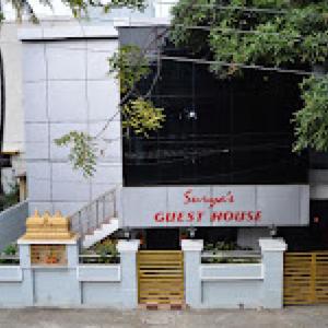 a building with a sign that reads guest house at Surya's Guest House in Chennai