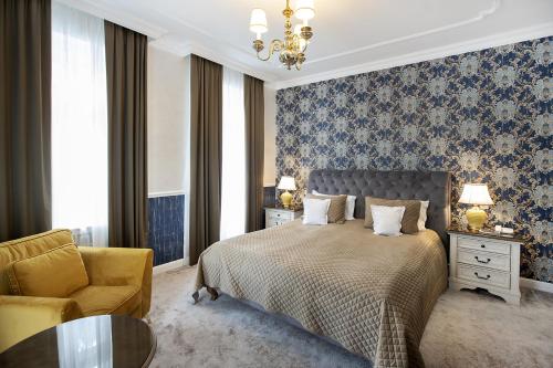 Кровать или кровати в номере Hotel Palace