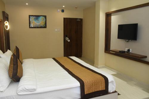 Ένα ή περισσότερα κρεβάτια σε δωμάτιο στο HOTEL IMPERIAL
