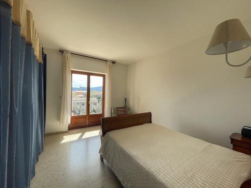 Letto o letti in una camera di Villa Les Oliviers proche centre Porto-Vecchio