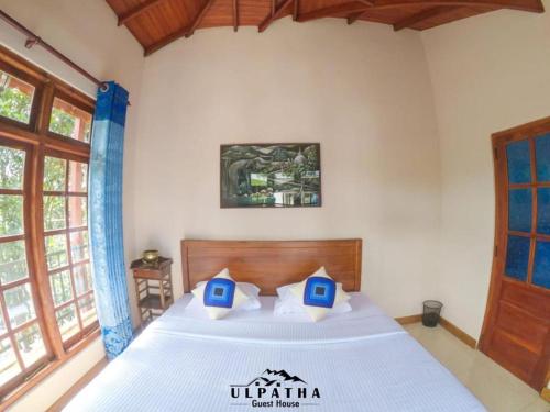 a bedroom with a bed in a room at Ulpatha Guest House in Hatton
