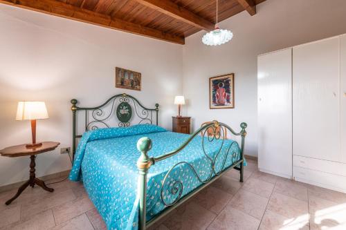 Postel nebo postele na pokoji v ubytování Villa Ambra