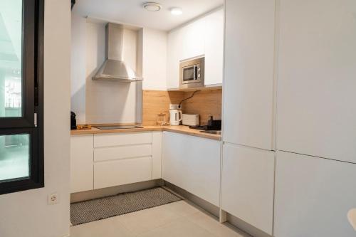 A kitchen or kitchenette at Apartment Andrea in Malaga Center