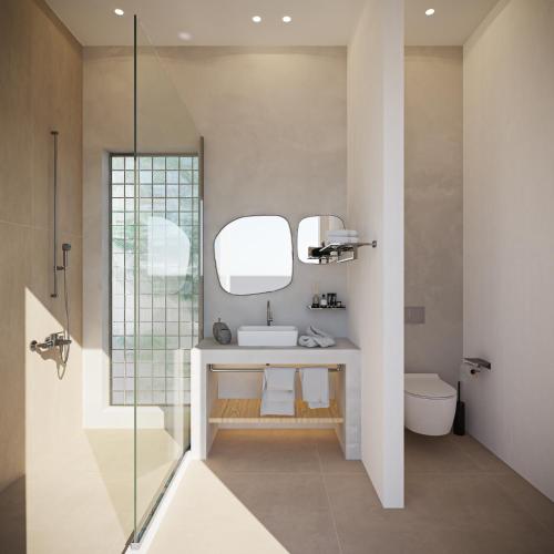 a bathroom with a sink and a mirror at Ionian Green in Kefalári
