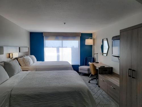 Ένα ή περισσότερα κρεβάτια σε δωμάτιο στο Holiday Inn Express Enid-Highway 412 by IHG