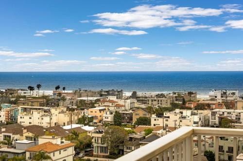 a view of a city and the ocean from a balcony at Sunset Haven 3-Bedrooms 2-Baths in Los Angeles