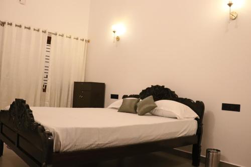 Postel nebo postele na pokoji v ubytování Coffeebean Villa - Unwind & Rejuvenate