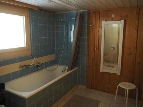 Kylpyhuone majoituspaikassa Appartement Gmeindmatte